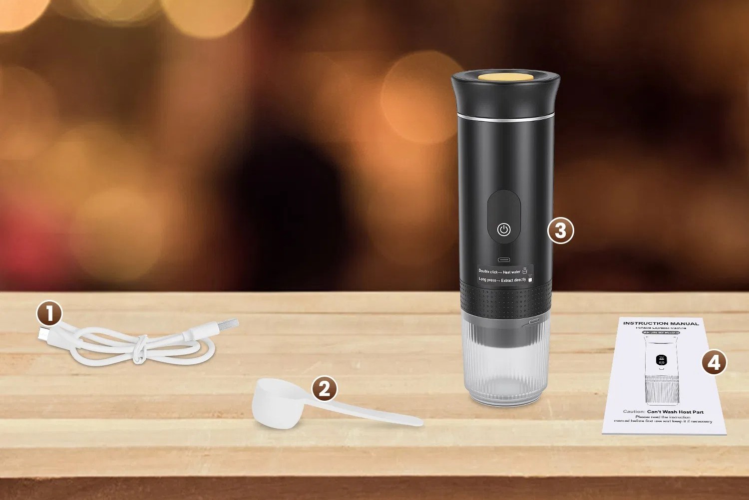 Package contents on a wooden table: USB-C cable, scoop, portable espresso machine, and instruction manual